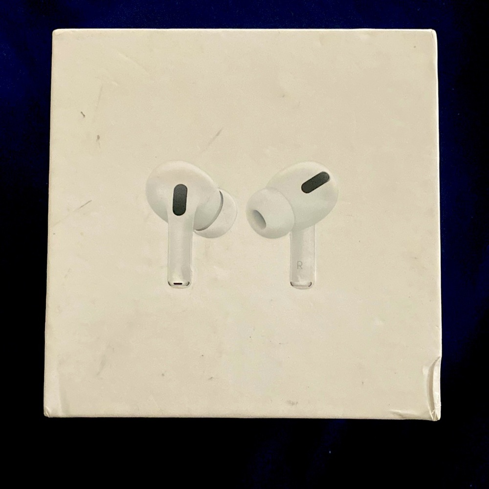 AirPods Pro with wireless charging case .